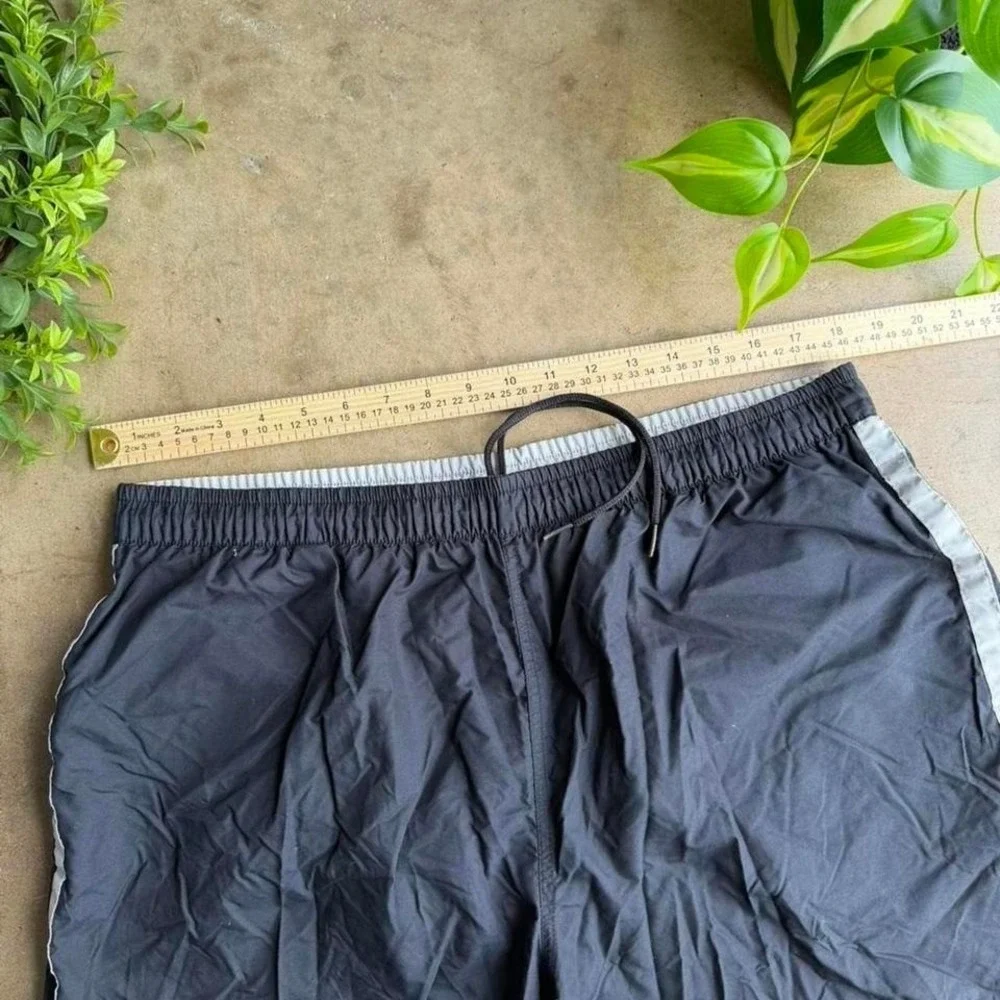 Vintage Black and grey 90s Nike spell out swim shorts size XL